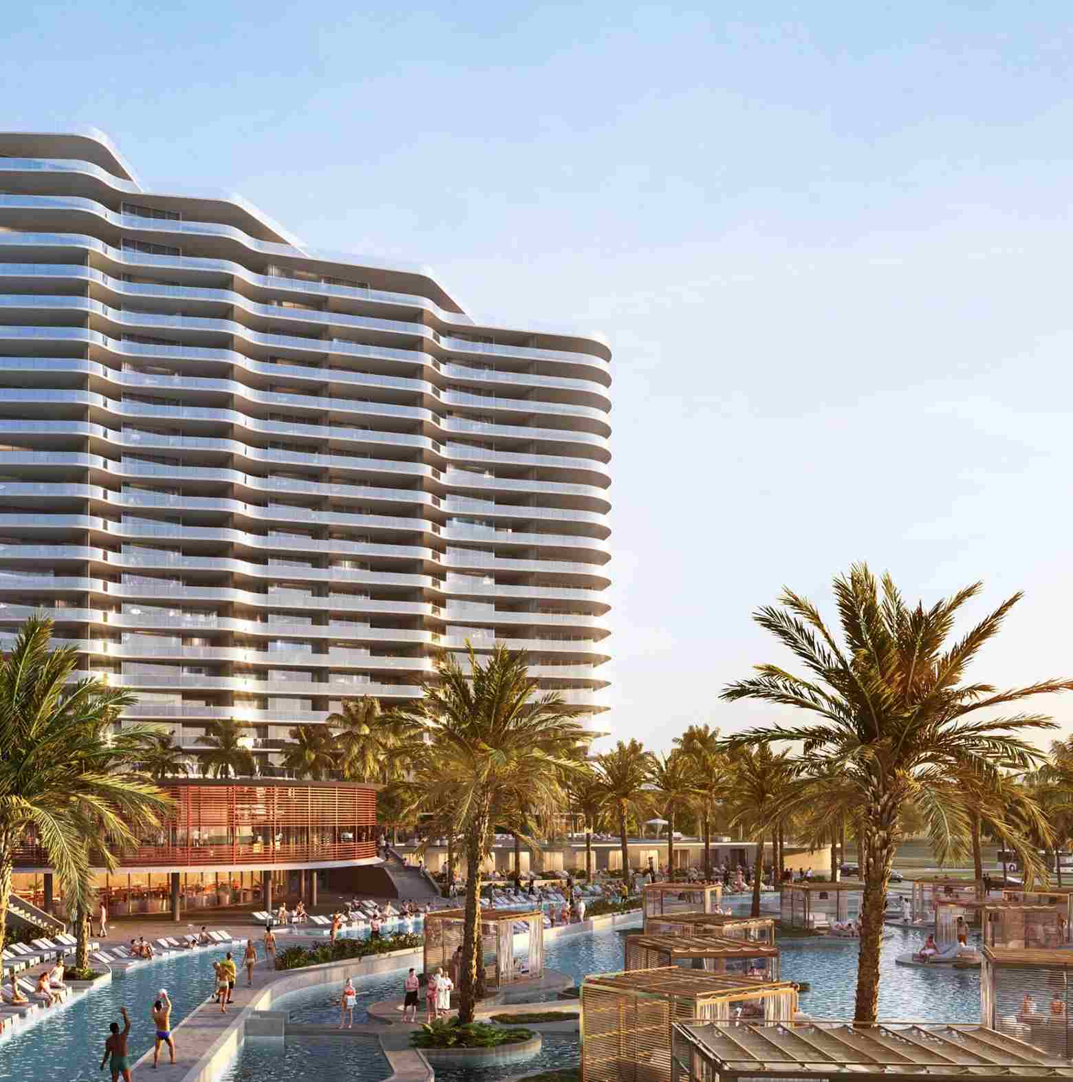 View of luxury tower and resort-style pool at The Ritz-Carlton Residences, Estero Bay